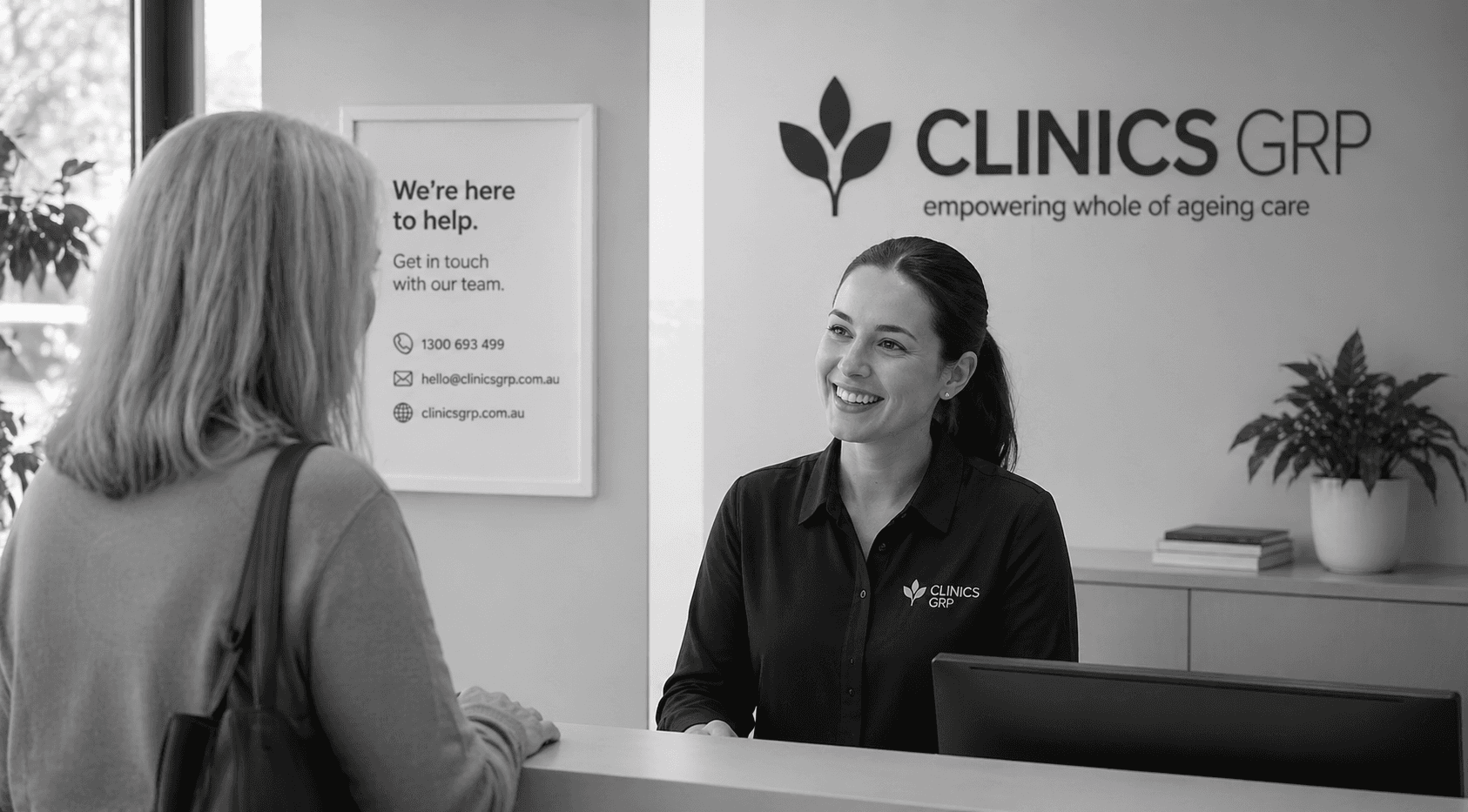 Clinics GRP intake reception supporting a visitor at the contact desk.